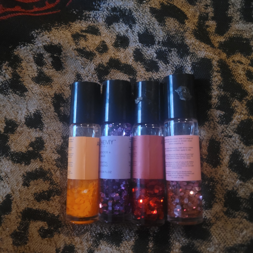 Vibrant Lip Gloss Collection - Orange, Purple, Red